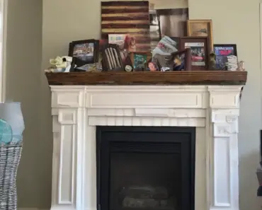 One Person’s Junk Becomes a Fireplace Cover In My Living Room
