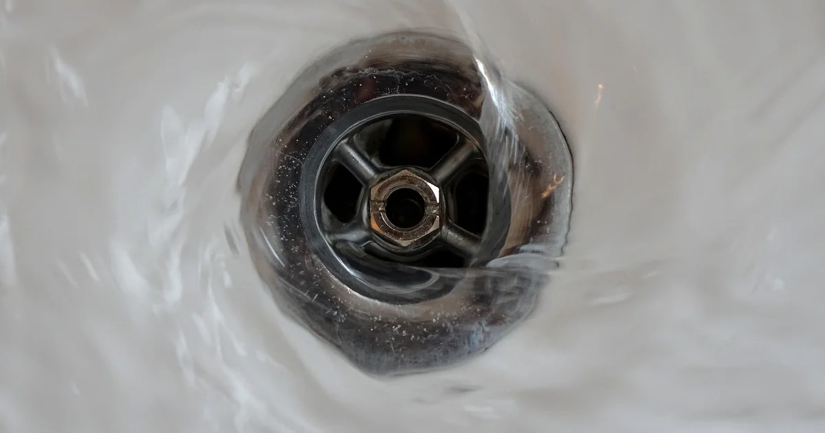 compression shower drain installation