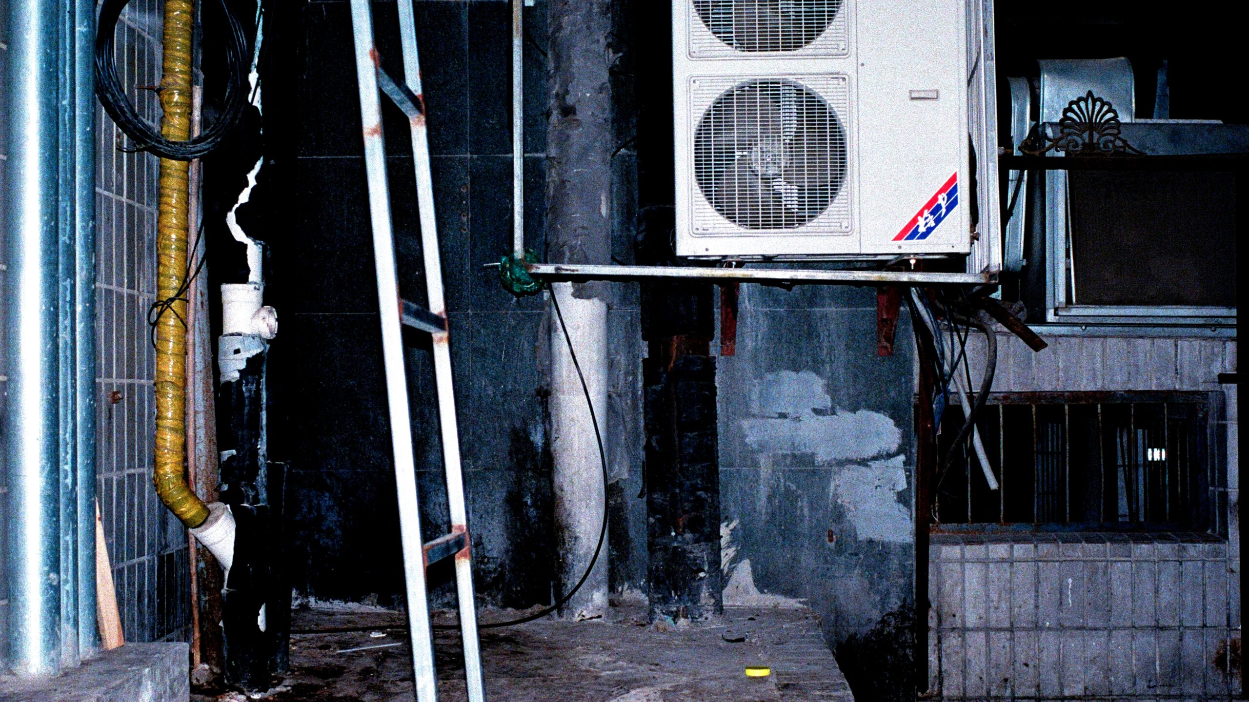 Outdoor air conditioner repair checklist with tools and condenser unit in background